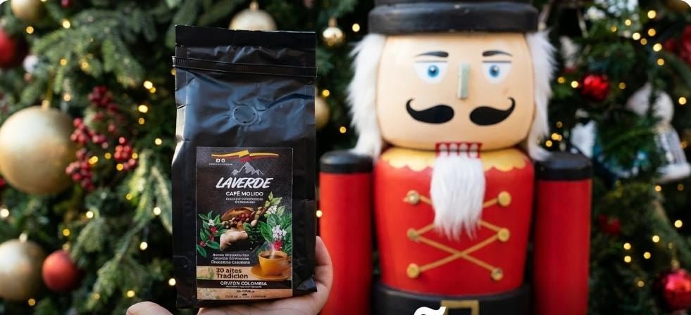 A bag of our Colombian coffee in front of a Christmas tree in Spain